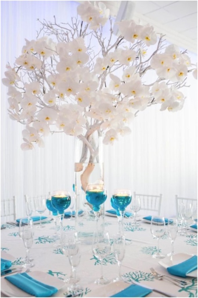 silver and white orchid tree centerpiece