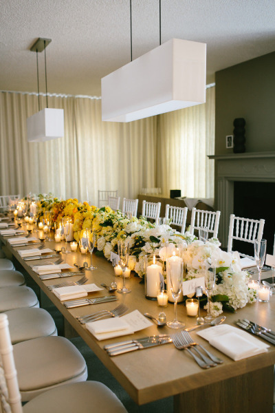 Love the candles in this floral arrangement! So chic