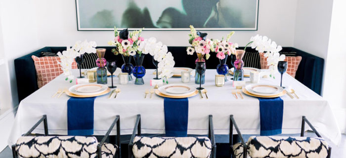 Fabulous Navy and gold valentines day dinner table- See all of the details on B. Lovely Events! #valentinesday #tablescape #orchids #anenomies #centerpiece